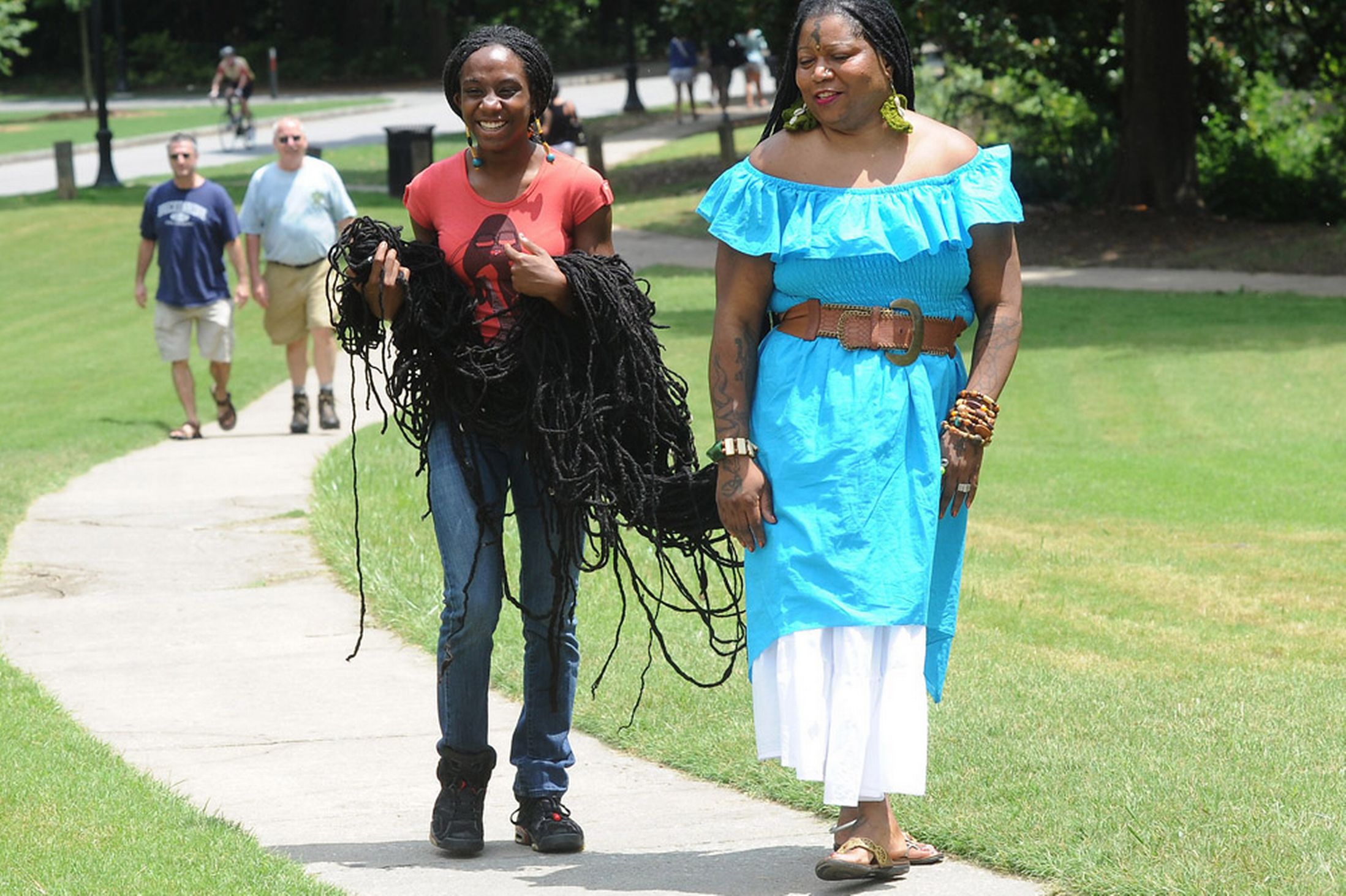 Самая длинная. Аша Зулу Мандела. Аша Мандела черная Рапунцель. Аша Мандела женщина с самыми длинными волосами. Самая длинная прическа в мире.